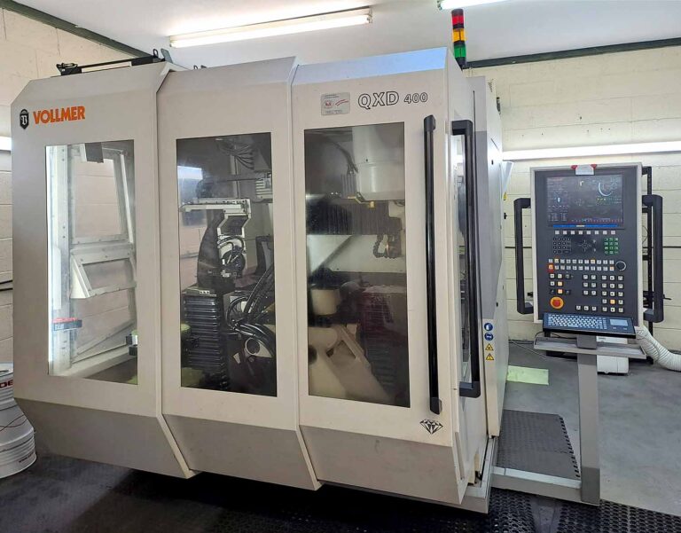 QXD 400 6 axis disc erosion machine for every type of machine tool, with twin stack robotic auto loading, auto disc changer, relief boby grinding and superior finish due to its V PULSE generator.